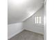 Attic space featuring natural light, and soft carpeting at 766 N Bancroft St, Indianapolis, IN 46201