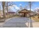 Backyard featuring an outdoor storage shelter and gray rock ground cover in a quaint fenced-in setting at 766 N Bancroft St, Indianapolis, IN 46201