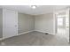 Cozy bedroom with neutral walls, plush carpeting, ceiling light and closet at 766 N Bancroft St, Indianapolis, IN 46201