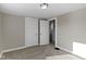 Bedroom with two closets and neutral carpeting at 766 N Bancroft St, Indianapolis, IN 46201
