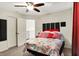 This is a view of a neat and tidy bedroom with convenient access to the home's other spaces at 7939 Crackling Ln, Indianapolis, IN 46259