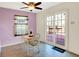 Cozy breakfast nook with a sliding glass door to the wooden deck outside at 7939 Crackling Ln, Indianapolis, IN 46259