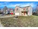 Beautiful two-story home with brick and siding, featuring a well-kept front yard at 7939 Crackling Ln, Indianapolis, IN 46259
