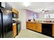 Practical kitchen features essential appliances and ample counter space at 7939 Crackling Ln, Indianapolis, IN 46259
