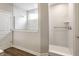 Bright bathroom featuring a large marble walk-in shower with a glass partition and seating at 804 Whispering Oaks Dr, Carmel, IN 46032