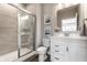 Bathroom featuring a white vanity with storage and a glass-enclosed tile shower at 804 Whispering Oaks Dr, Carmel, IN 46032