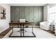 Home office with a wooden desk, modern decor, natural light, and wood floors at 804 Whispering Oaks Dr, Carmel, IN 46032