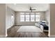 Living room with hardwood floors, natural light, and modern seating at 804 Whispering Oaks Dr, Carmel, IN 46032
