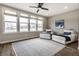 Bright living room with modern furniture, large windows, and natural light at 804 Whispering Oaks Dr, Carmel, IN 46032