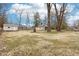 Expansive backyard with mature trees, providing ample space and natural beauty at 8190 Jordan Ln, Indianapolis, IN 46240
