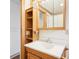 Bathroom with a wooden-framed mirror and sink at 8190 Jordan Ln, Indianapolis, IN 46240