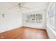 Bright bedroom with wood floors, white walls and large windows creates a cozy and well-lit retreat at 8190 Jordan Ln, Indianapolis, IN 46240