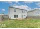 Backyard features a deck, grass, and privacy fence at 8444 Ash Grove Dr, Camby, IN 46113