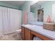 Bathroom features a large mirror, shower with white curtain, and wood cabinets at 8444 Ash Grove Dr, Camby, IN 46113
