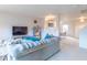 Comfortable living room with a plush sofa and easy access to other living spaces at 8444 Ash Grove Dr, Camby, IN 46113
