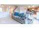 Inviting living space with a plush sofa and seamless transition to the kitchen area at 8444 Ash Grove Dr, Camby, IN 46113