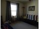 Bedroom with a futon, toys, and a large window that provide ample light at 8848 Hosta Way, Camby, IN 46113