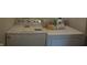Bright laundry room featuring a Whirlpool washer and dryer at 8848 Hosta Way, Camby, IN 46113