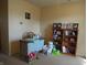 Bright office space with a desk and bookcase for storage at 8848 Hosta Way, Camby, IN 46113