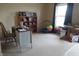 Bright office space featuring a desk, shelving, and a window for natural light at 8848 Hosta Way, Camby, IN 46113