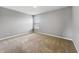 A bright and airy bedroom offers plush carpeting and neutral decor, creating a serene space at 9034 Faulkner Dr, Indianapolis, IN 46239