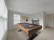 Recreation area with a stylish pool table, perfect for entertaining and relaxation at 9034 Faulkner Dr, Indianapolis, IN 46239