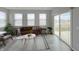 Bright living room with a sliding glass door, offering seamless indoor-outdoor living at 9034 Faulkner Dr, Indianapolis, IN 46239