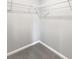 A bright, empty walk-in closet provides ample storage space and organization potential at 9034 Faulkner Dr, Indianapolis, IN 46239