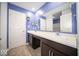 Bathroom featuring double sinks, neutral wall color, and framed mirrors at 10202 Meadow Path Ln, Indianapolis, IN 46239