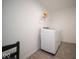 Functional laundry room with modern washer and dryer at 10202 Meadow Path Ln, Indianapolis, IN 46239
