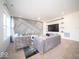 Modern living room showcasing stylish sofas, a large TV, and contemporary decor at 10202 Meadow Path Ln, Indianapolis, IN 46239