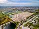 Aerial view of the community, showcasing various homes, ponds, and surrounding areas at 1101 Knoll Ct, Greenwood, IN 46143