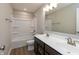 Bathroom with a double sink vanity, framed mirror, and a bathtub and shower combination at 1101 Knoll Ct, Greenwood, IN 46143