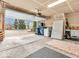 Open garage with overhead lighting, white walls and concrete floor at 11936 Esty Way, Carmel, IN 46033
