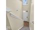 Stairway leading to front door, featuring tile landing and carpeted steps at 11936 Esty Way, Carmel, IN 46033