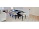 Contemporary dining area showcasing a sleek table and stylish seating for six at 1208 N Alabama St, Indianapolis, IN 46202