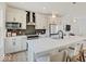 Well-lit kitchen featuring stainless steel appliances, quartz countertops, modern cabinetry, and open layout at 1208 N Alabama St, Indianapolis, IN 46202