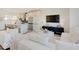 Open-concept living space featuring kitchen with island seating, dining area, and living room at 1208 N Alabama St, Indianapolis, IN 46202
