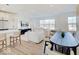 Spacious open living space with seating and a modern kitchen at 1208 N Alabama St, Indianapolis, IN 46202