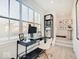 Inviting home office with abundant natural light and practical built-in shelving at 1208 N Alabama St, Indianapolis, IN 46202