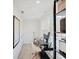 Home office featuring a modern desk, shelving, and an abundance of natural light at 1208 N Alabama St, Indianapolis, IN 46202