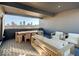 Outdoor patio with modern furniture and views of the city skyline at 1208 N Alabama St, Indianapolis, IN 46202