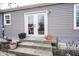 Back entrance featuring white double doors at 1208 W 8Th St, Anderson, IN 46016