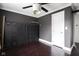 Bedroom with hardwood floors and a unique wall of lockers at 1208 W 8Th St, Anderson, IN 46016