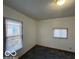 Bedroom with light colored walls and carpeted floors at 1342 W 18Th St, Indianapolis, IN 46202