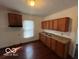Cozy kitchen with wood cabinets and plenty of counter space at 1342 W 18Th St, Indianapolis, IN 46202