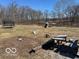 Large lot includes trampoline, swing set, picnic table and slide perfect for Gathering fun at 13863 N Stiles Rd, Mooresville, IN 46158