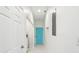 Bright hallway to backyard with access to laundry room and backyard at 1804 Spann Ave, Indianapolis, IN 46203