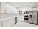 Well-equipped kitchen features stainless steel appliances and ample counter space at 1804 Spann Ave, Indianapolis, IN 46203