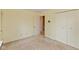Bedroom featuring a large closet and carpeted flooring at 2830 Moller Rd, Indianapolis, IN 46224